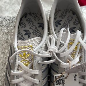 Adidas  Womens’s White and Gray Sneakers with Yellow Accent